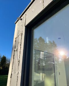 Detail Neubau Ganzglas Schiebetür